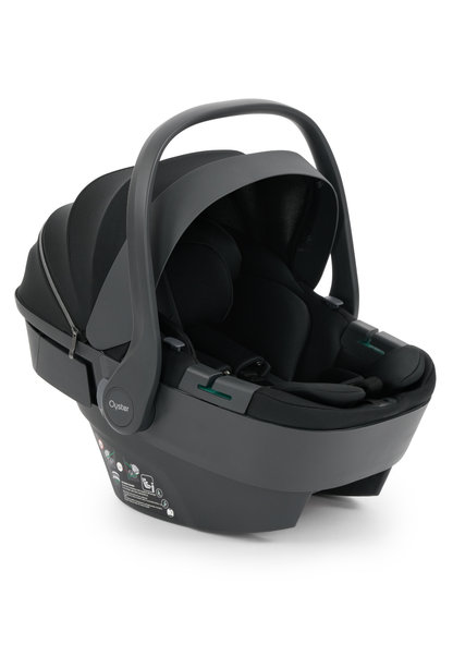 Oyster baby car seat infant carrier in all-black graphite colorway on white background